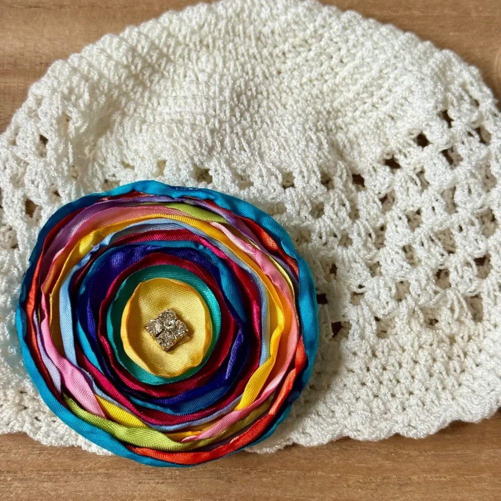 White‎ Crochet Baby Hat With Multicolor Satin Flower Appliqué